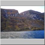 Famous Norwegian fjords: narrow bay enclosed by high rocks