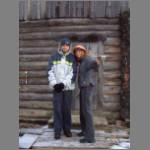 Natalia and I pose in front of the bath house -- where you can take a steam bath to forget the Russian cold