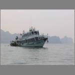 Boarding a big boat from a longtail one