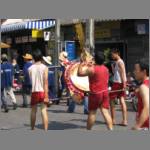 Demonstrators walk to the sound of drums