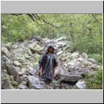 Hiking a stony path in the rain